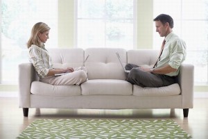 Couple Working Together at Home --- Image by © Royalty-Free/Corbis